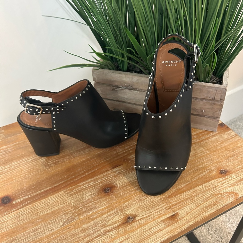 Beautiful Givenchy peep toe shoes with silver studs. Worn once black leather